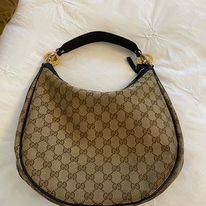 authentic Gucci twin GG hobo bag.
